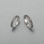 Par de Alianças Ondas Negras